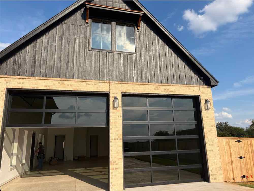 Glass garage doors on the showcase home